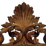 Carved and gilded wooden mirror with floral motif