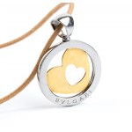 BULGARI: with a gold and steel pendant necklace