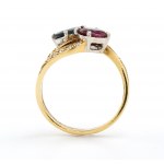 Gold ring with a ruby and a sapphire