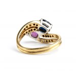 Gold ring with a ruby and a sapphire