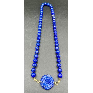 Lapis gold necklace and pair of earrings.