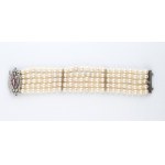 5 strand saltwater cultured pearl bracelet, gold clasp set with diamond and ruby