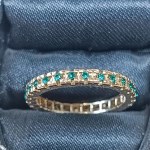 Zlatý prsteň so zelenými očami