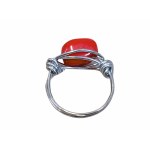 Ring with red eyelet