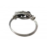 Ring with three black eyes