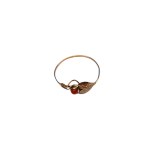 Gold ring with round eye of natural coral