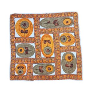 Sling in shades of orange with a motif of painted flowers
