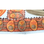 Sling in shades of orange with a motif of painted flowers