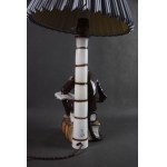 Lampa Małpa na książkach, Pacyków, lata 30-te.