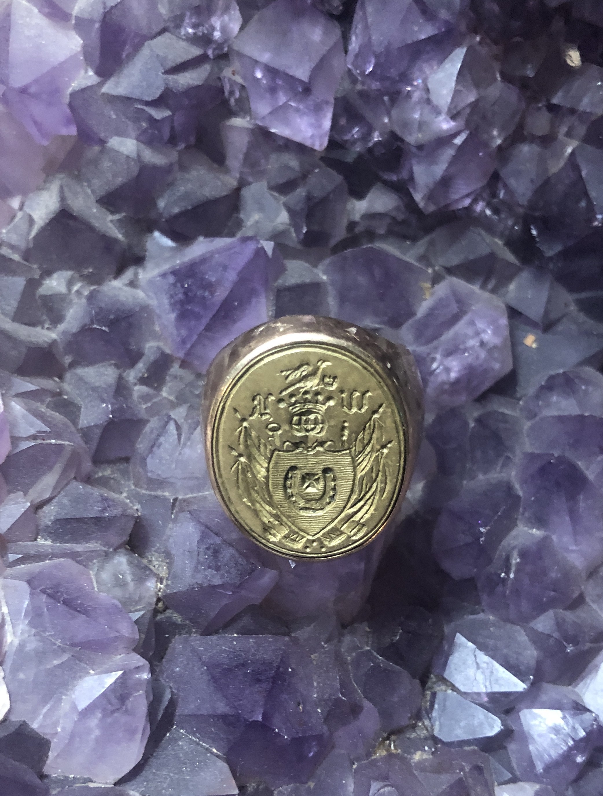 nn, Gold signet ring with the 