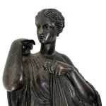 Sculpture: Woman in Roman attire.