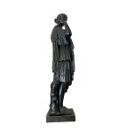 Sculpture: Woman in Roman attire.