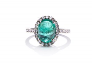 Ring with emerald and diamonds early 21st century.