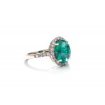 Ring with emerald and diamonds early 21st century.