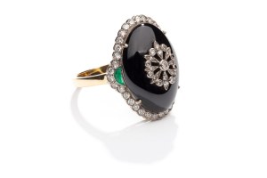 Ring with onyx, diamonds and emeralds 1960s-70s.