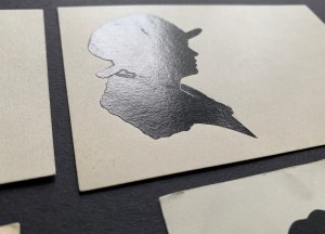 Set of 4 postcards - silhouette portraits [before 1939].