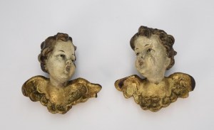 A pair of angel heads