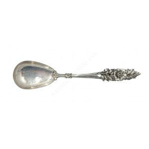 A salad spoon with a floral motif,