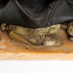 inkwell in the shape of a trophy of arms and Napoleon's hat, yellow marble base