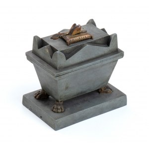 ancient metal inkwell in the shape of the imperial sarcophagus
