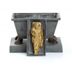 ancient metal inkwell in the shape of the imperial sarcophagus
