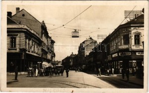 1933 Miszkolc, Széchenyi utca, Haász J., Pataki üzlete, villamos, autóbusz (fl)