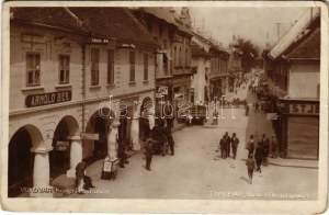 Vukovár, Vukovar; Kralja Petra ulica / utca, Arnold Bier üzlete / Straßenansicht mit Geschäften (kopott sarkak / abgenutzte Ecken...