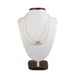Double necklace of graduated pearls 3-7.5mm, gold clasp emerald 0.15ct
