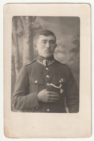 PORTRET eines Mitglieds eines Militärorchesters. Anfang der 1920er Jahre