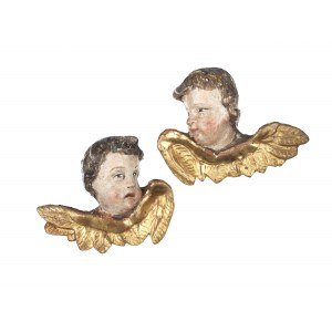 Pair of winged putti heads, South German, mid 18th century