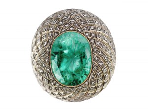 Pendant, precious metal setting, set with small diamonds, a large emerald in the centre