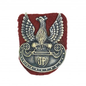 Cap eagle with the letters JP