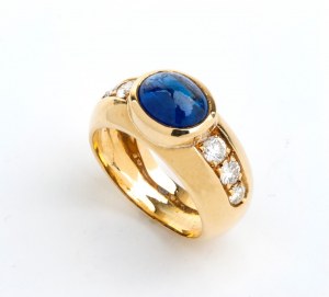 Anello a fascia in oro con zaffiro blu e diamante