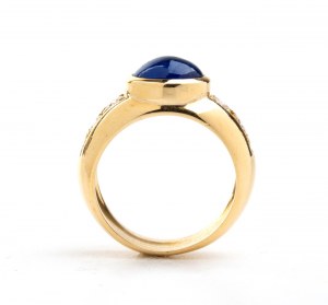 Blue sapphire diamond gold band ring