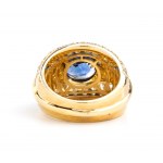 Anello a fascia in oro con zaffiro blu e diamante