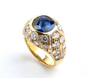 Anello a fascia in oro con zaffiro blu e diamante