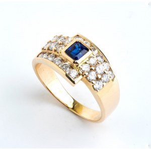 Anello d'oro con zaffiro blu e diamante
