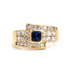 Złoty pierścionek z niebieskim szafirem i diamentem