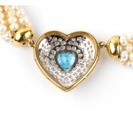 Collier en or avec topaze bleue, diamant et perle