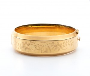 Rigid hoop gold bracelet