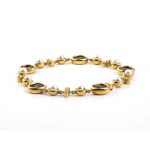 Gold bracelet with pearls, diamonds, and coins