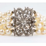 Bracciale in oro con perle e diamanti