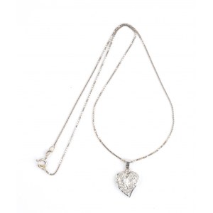 Gold necklace with a heart shaped gold diamond pendant