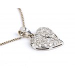 Gold necklace with a heart shaped gold diamond pendant