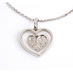 Gold necklace with a heart shaped gold diamond pendant