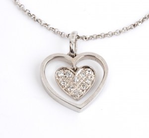 Gold necklace with a heart shaped gold diamond pendant