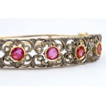 Gold and silver rigid hoop bracelet Gold and silver rigid bracelet with rubies and diamonds