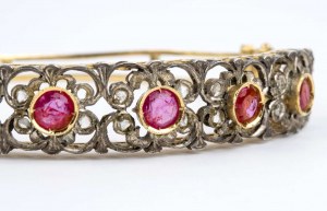 Gold and silver rigid hoop bracelet Gold and silver rigid bracelet with rubies and diamonds