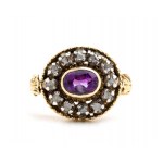 Gold and silver ring with diamonds and amethyst