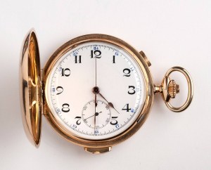 Gold pocket watch with watch chain